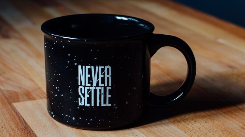 black ceramic mug on table