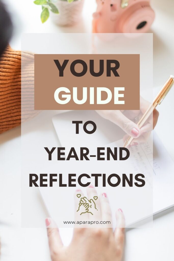 a women writing on a journal with text overlay "your guide to year-end reflections